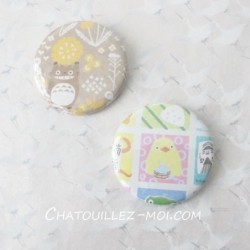 2 Badges Totoro et poussin...