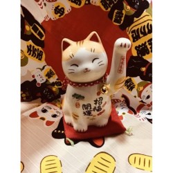 Maneki neko, chat porte-...